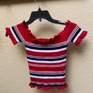 Red, white, and blue shoulder less top.